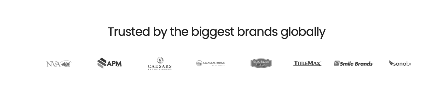 The logo wall: eight named brands under the line Trusted by the biggest brands globally